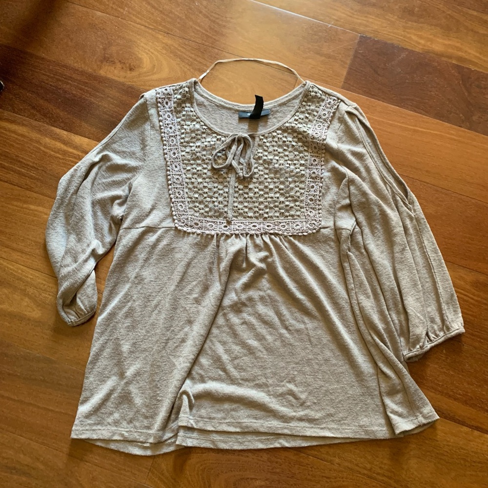 Elegant top with intricate pattern in front